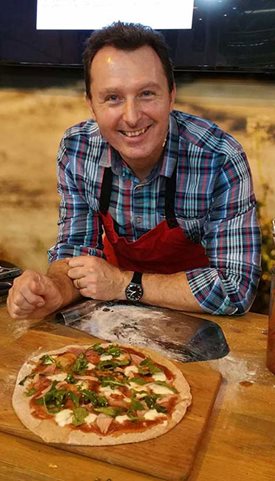 Andrew Dickens with his Halloween pizza