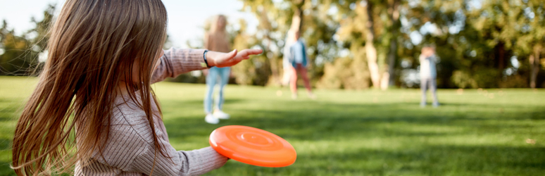 kids playing with a frisbee