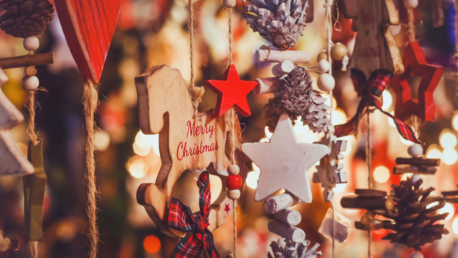 Wooden festive decorations on market stall