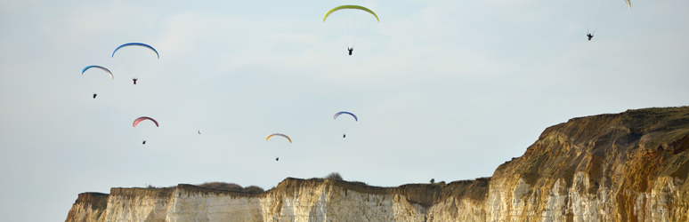 Paragliding from Newhaven Cliffs , South Downs East Sussex