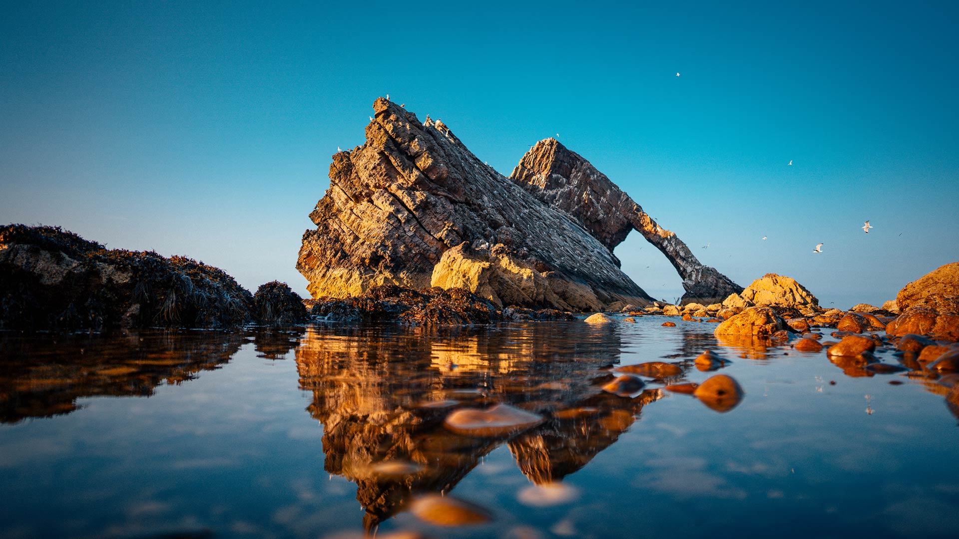 Boulder in water