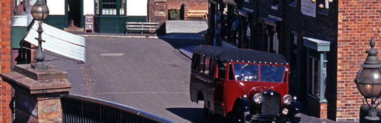 Black country museum street and old red truck