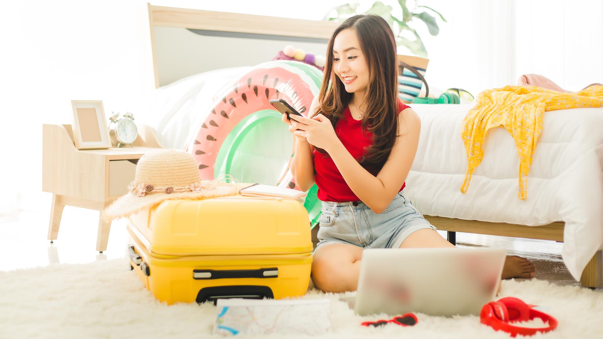 Girl packing for the beach