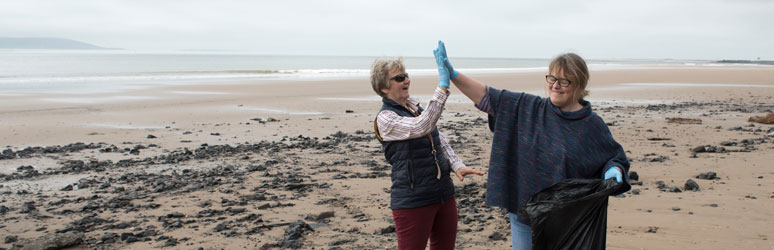 Cleaning up a beach