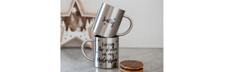 two personalised mugs