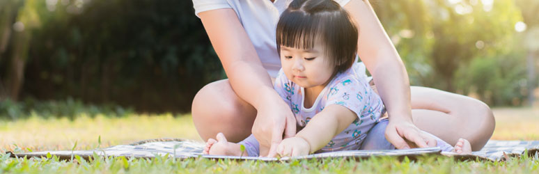 Baby playing outside