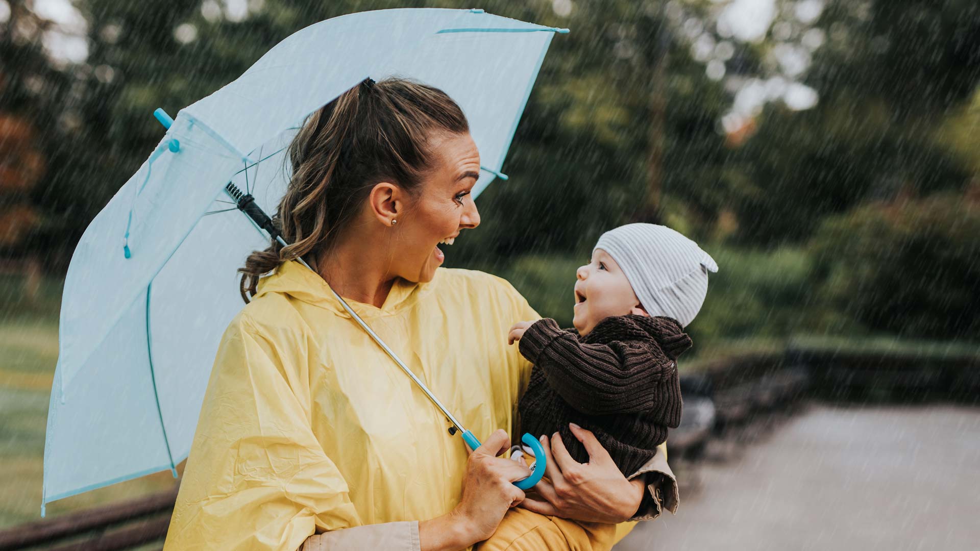 Mum and baby in the rain