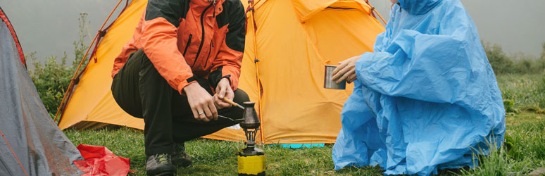 Cooking on camping stove in rain