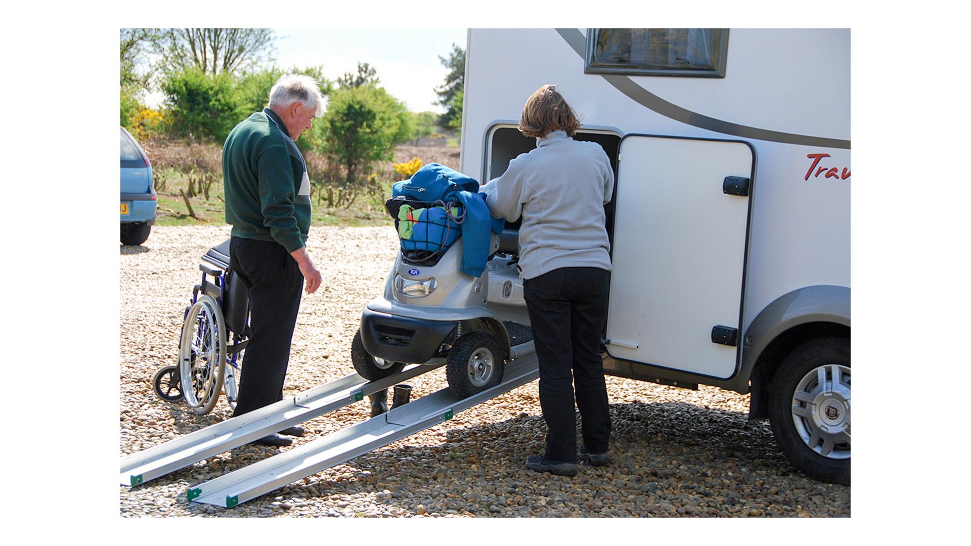 A motorhome storage ramp and a scooter