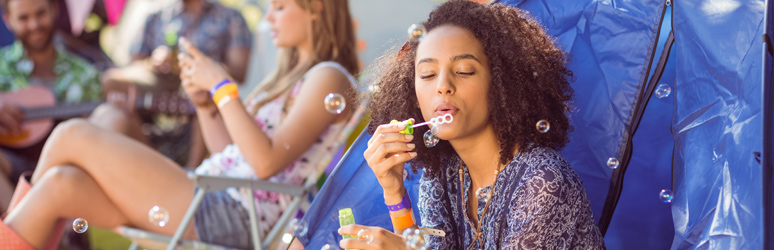 Camper blowing bubbles