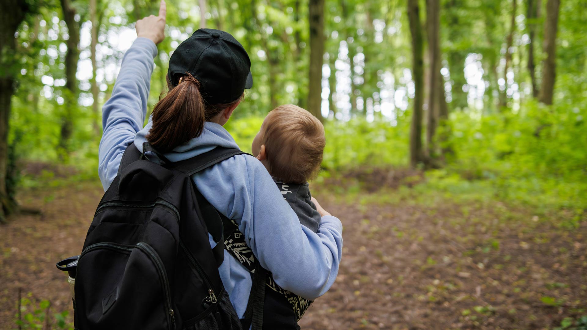Mother and baby on a woodland walk