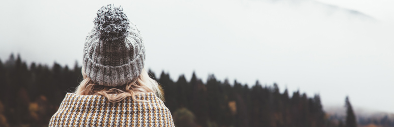 Lady wearing winter hat on cold day