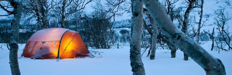 Orange tent in snow