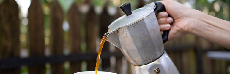 pouring coffee into a cup