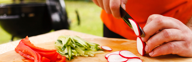 person cutting veg