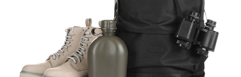 Walking boots, water bottle and sleeping bag