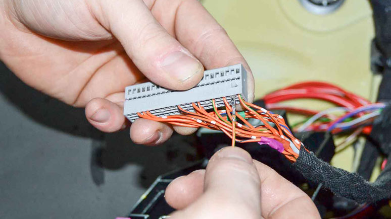 Connections being made into the car's computer wiring