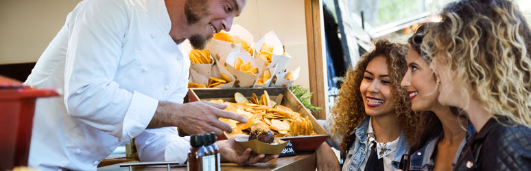 Chef serving food at festival