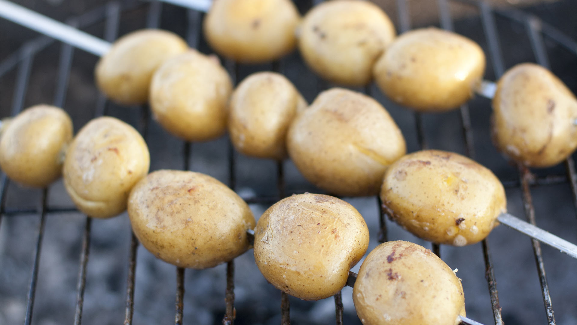 New potato skewers with satay sauce