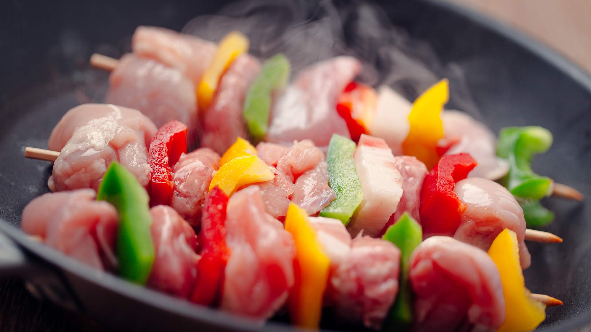two chargrilled chicken skewers