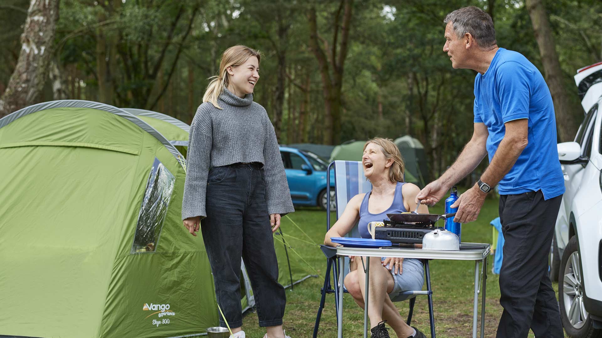 Family cooking on Sandringham Campsite