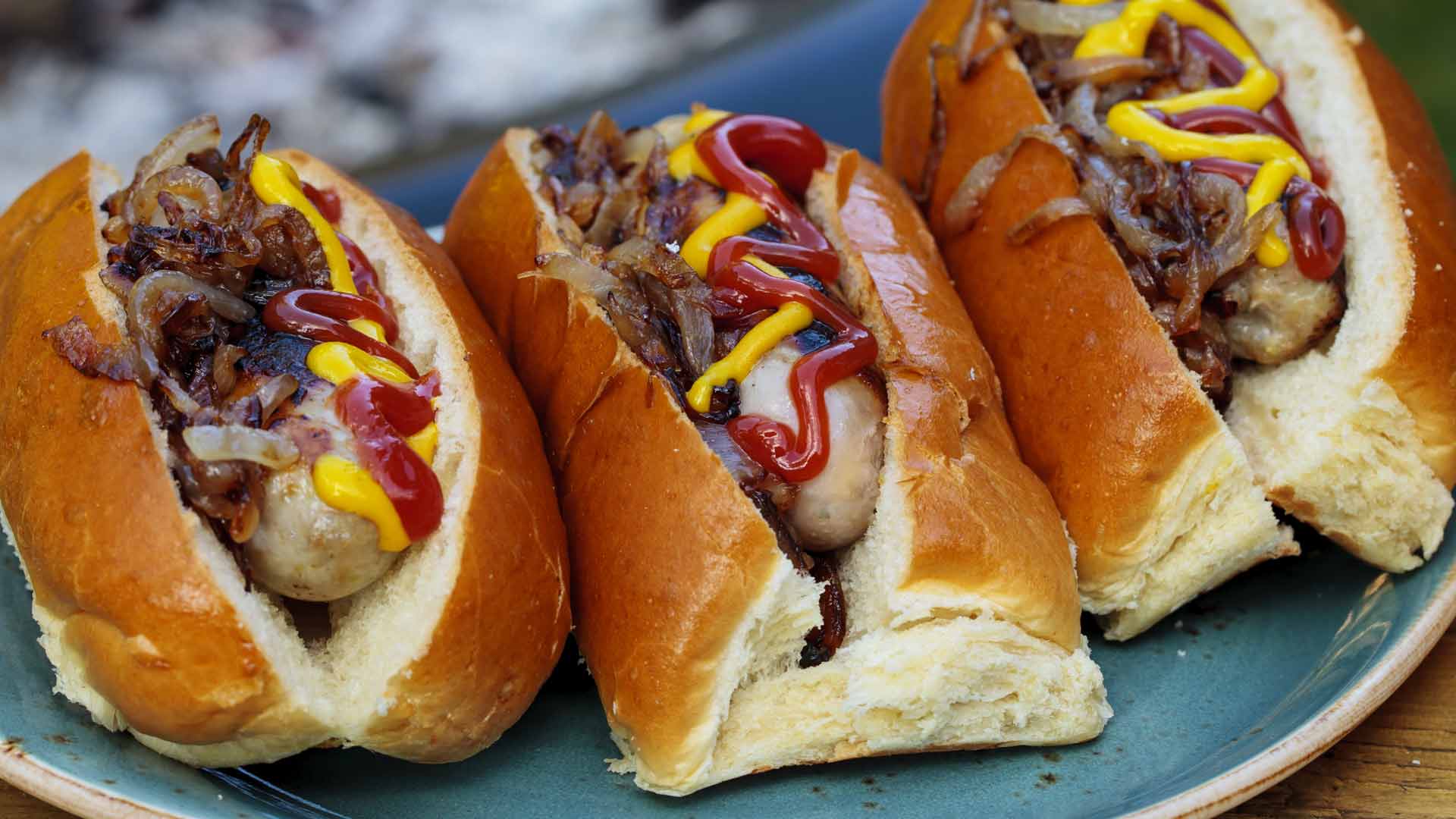 three hot dogs side by side