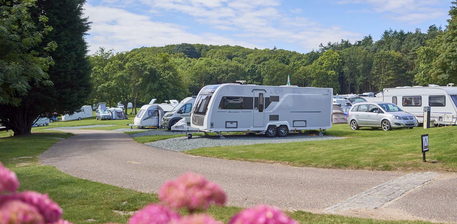 Caravans and campervans pitched up on West Runton campsite. 