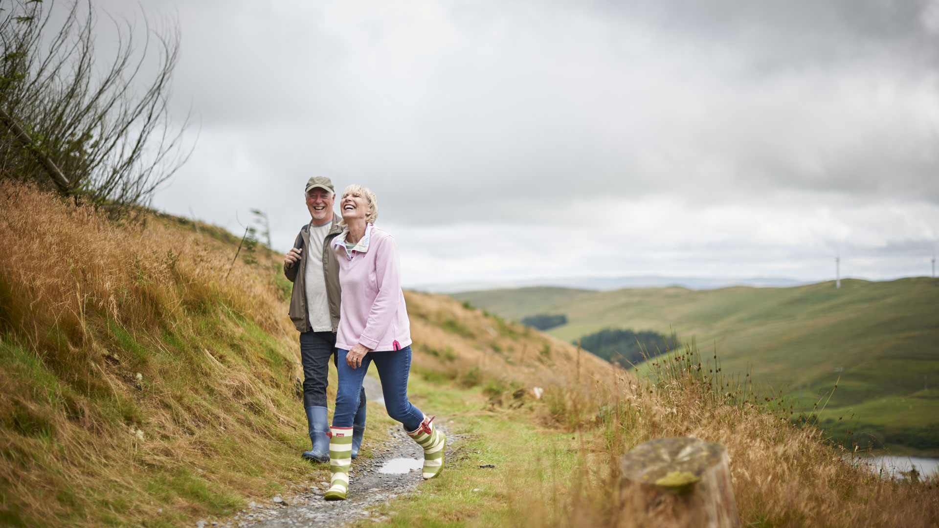 Couple walking through the countryside 