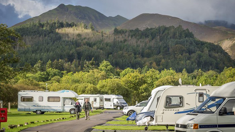 Caravans and motorhomes pitched on Keswick Campsite in the Lake District