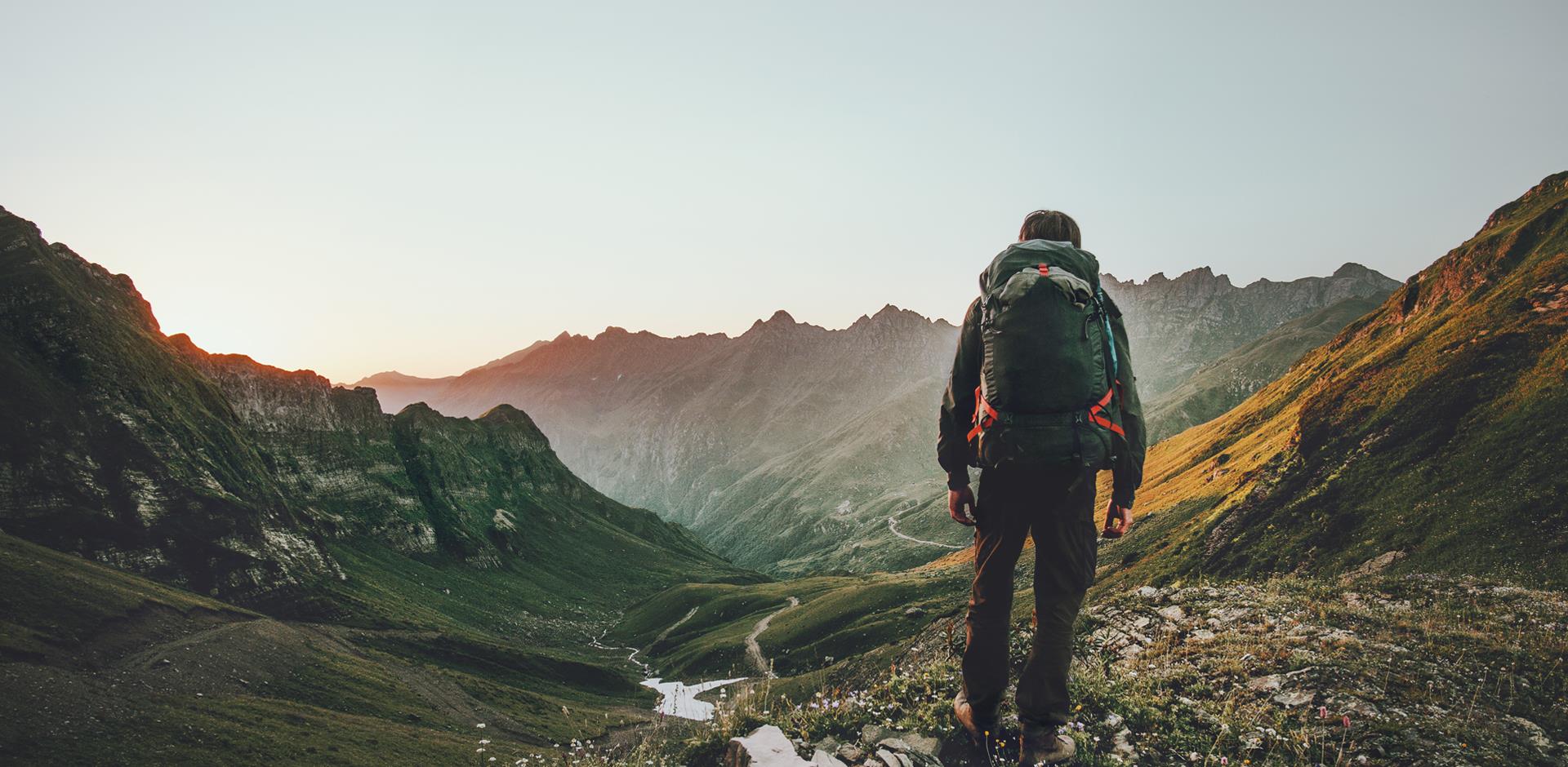 Guy carrying a backpack and travelling