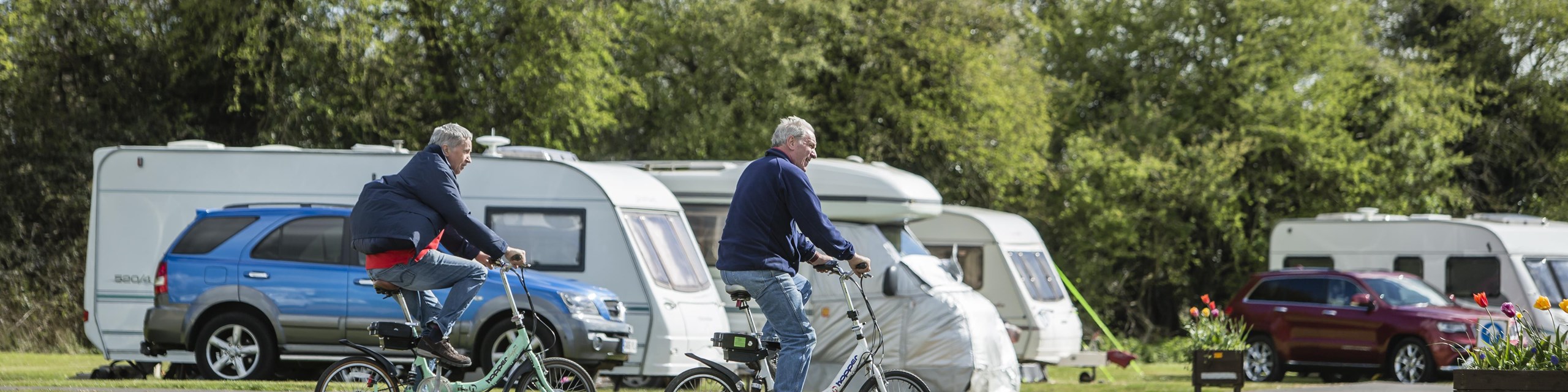 Cycling through Cambridge campsite