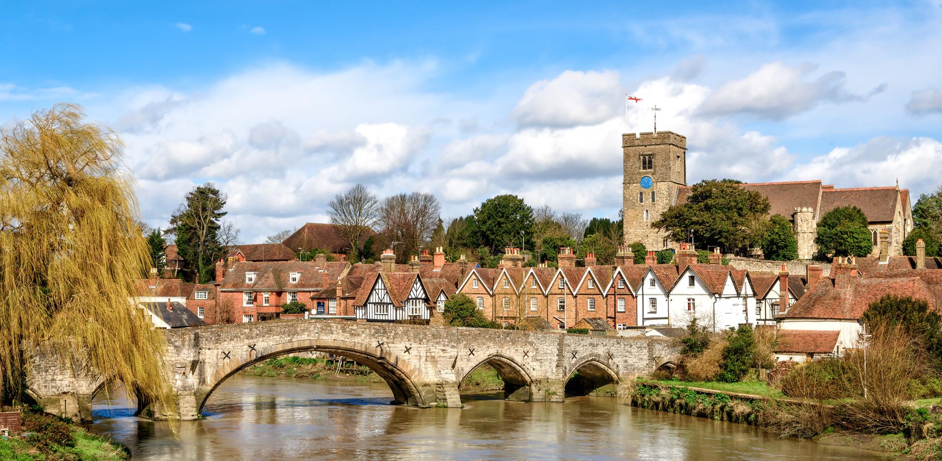 Medieval bridge and church in Aylesford, Kent, England.
