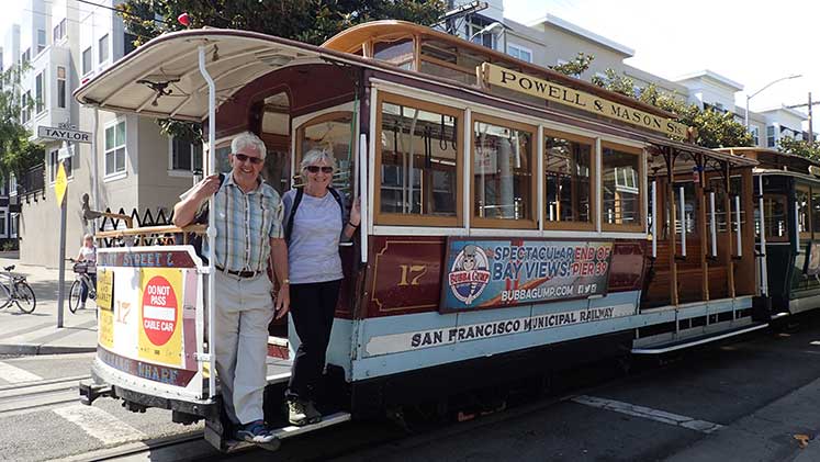 Hazel and Peter on a street car in San Francisco