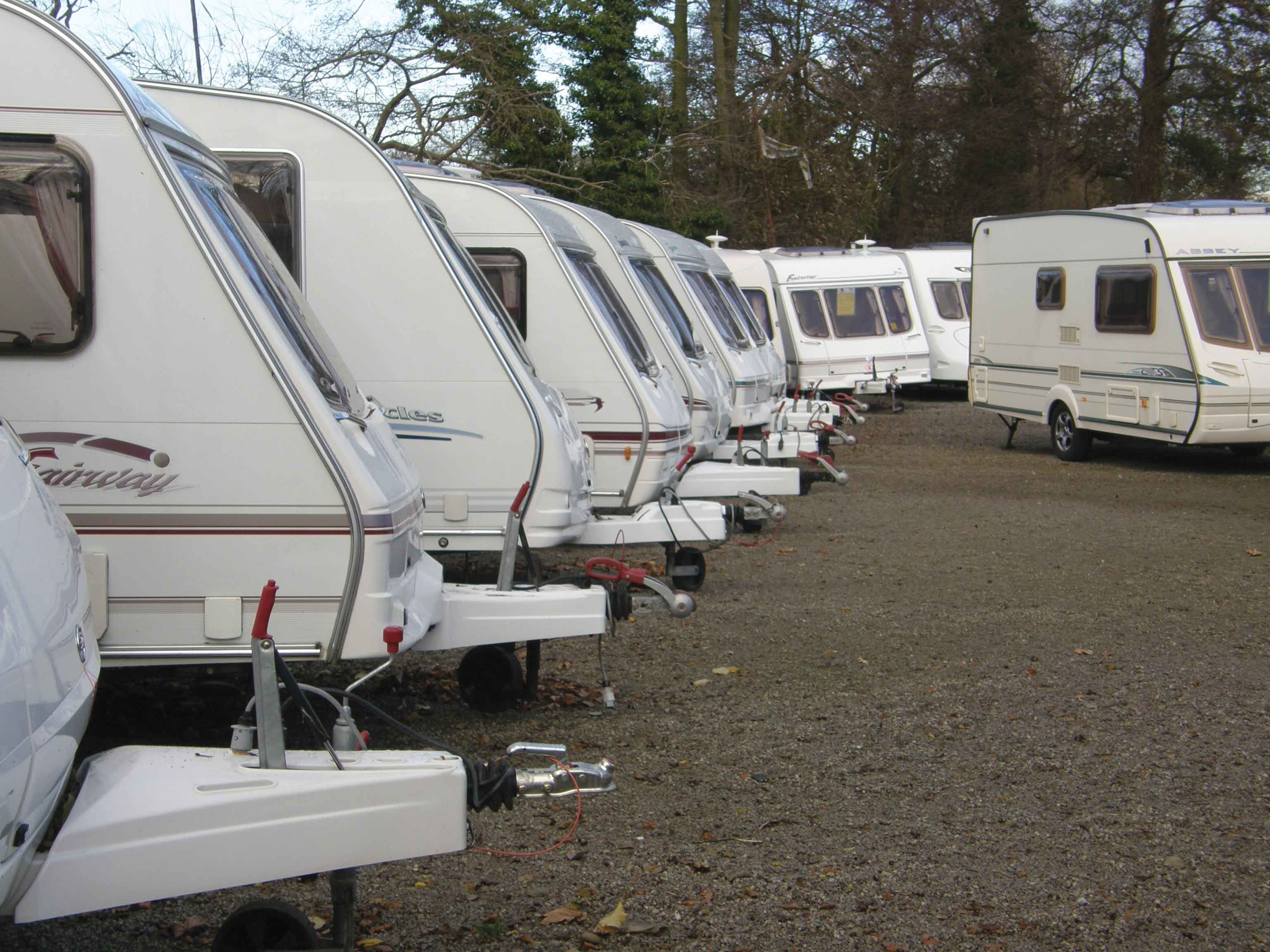 A range of caravans on sale at a caravan dealer 