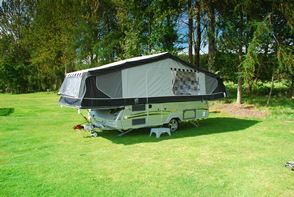 A folding camper without its awning