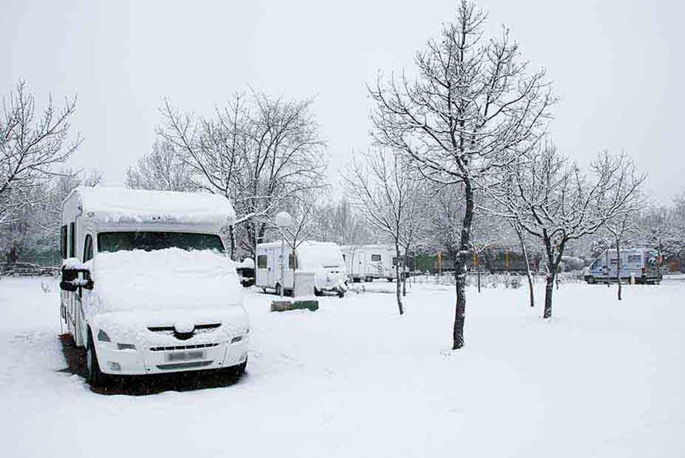 Winter touring caravan on a club site