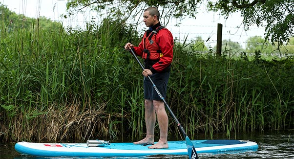 Stuart gets to grips with SUP. Credit: Jay Haysey